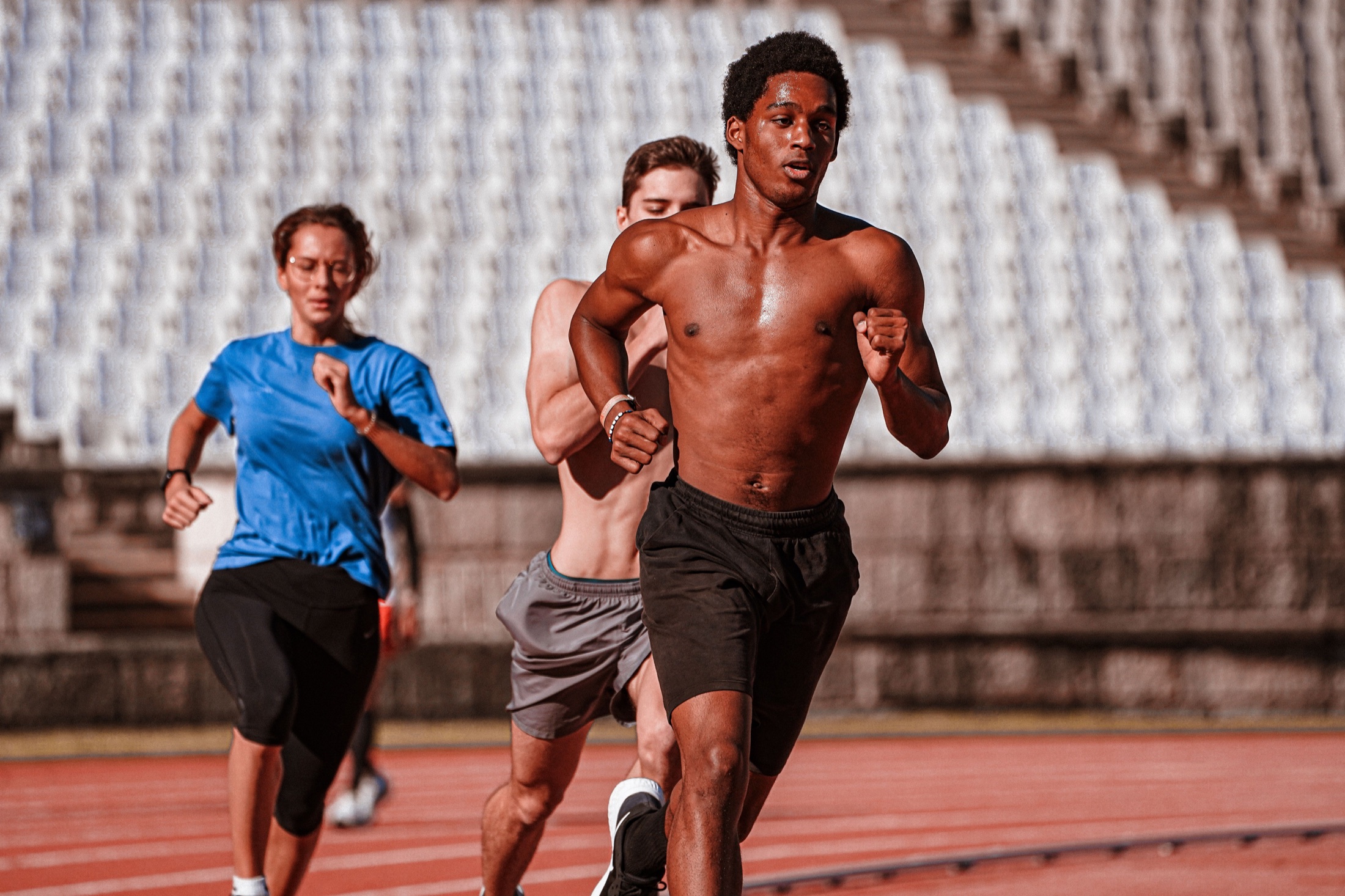 Runners training together on a track